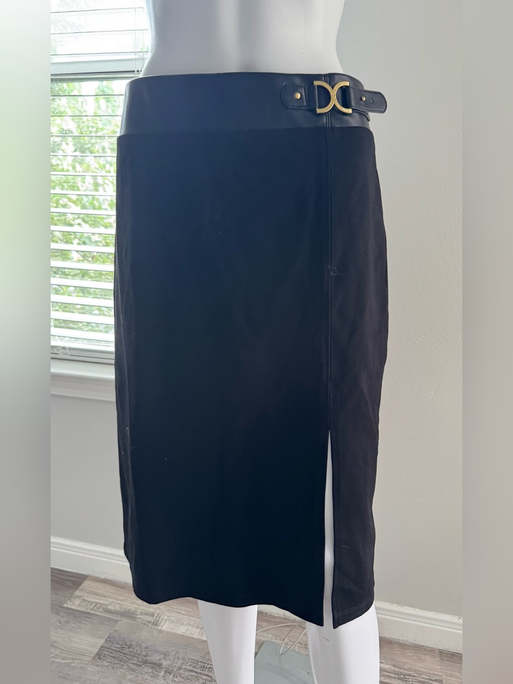 Marc New York Andrew Marc. This elegant black midi-length pencil skirt, crafted